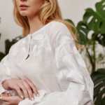 Women's embroidered white on white author's work