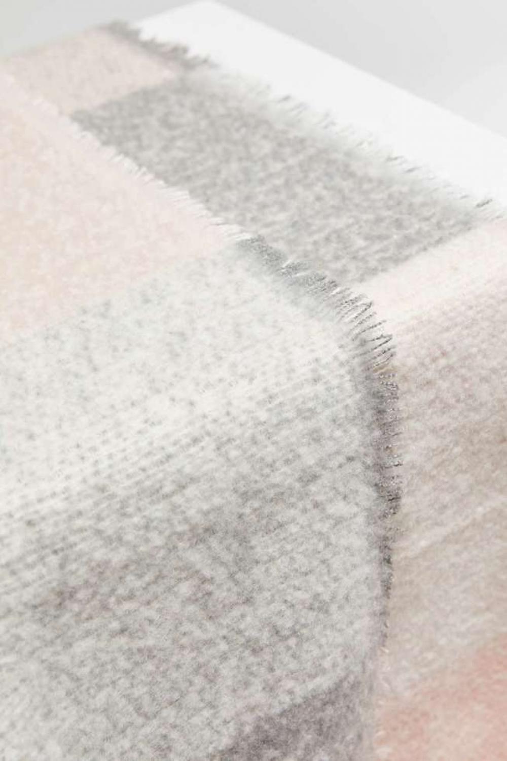 A pink checkered scarf