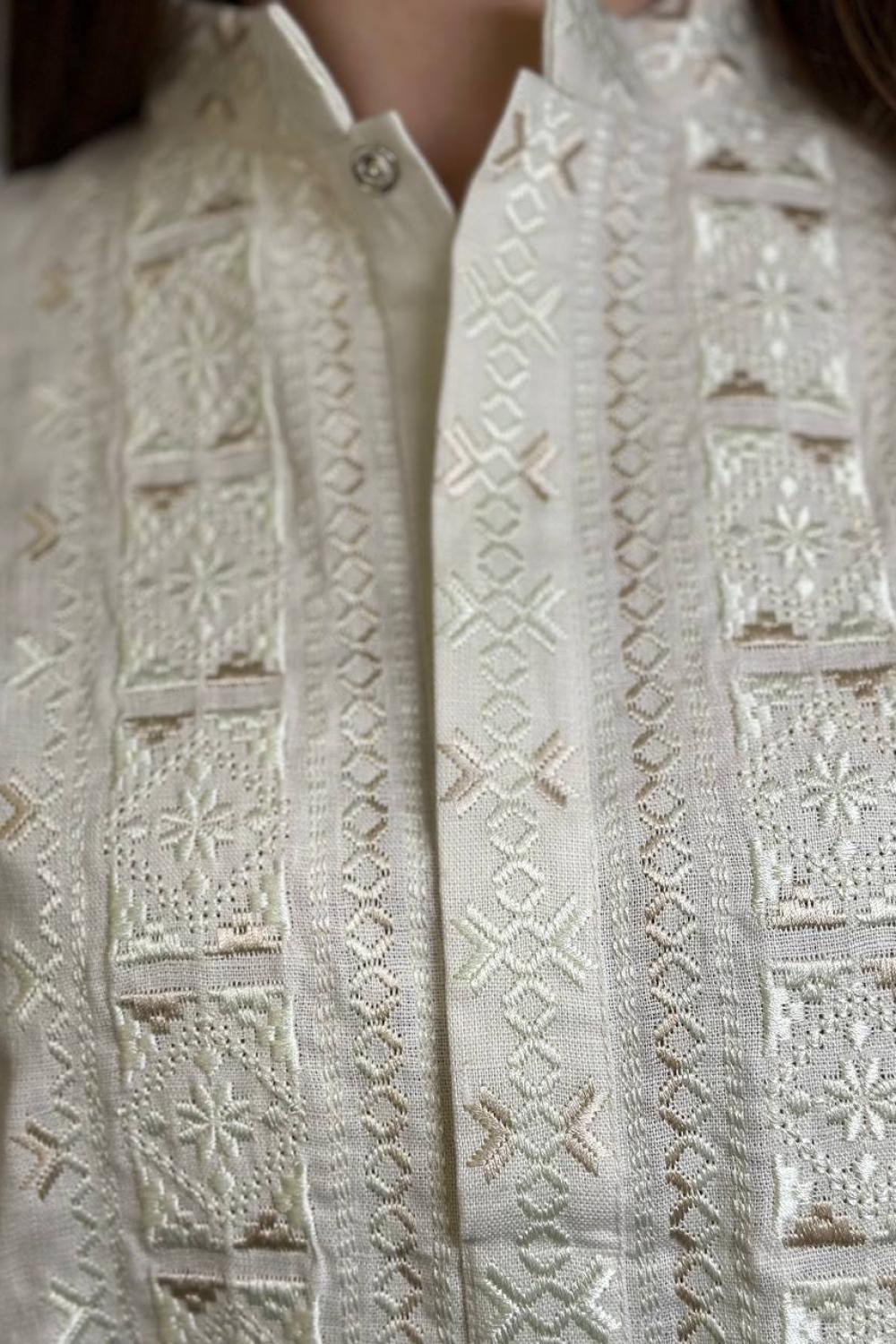 Men's embroidered shirt in a traditional style in a milky ceremonial color