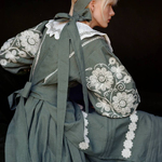 Khrystyna's embroidered dress of the author's work in emerald color