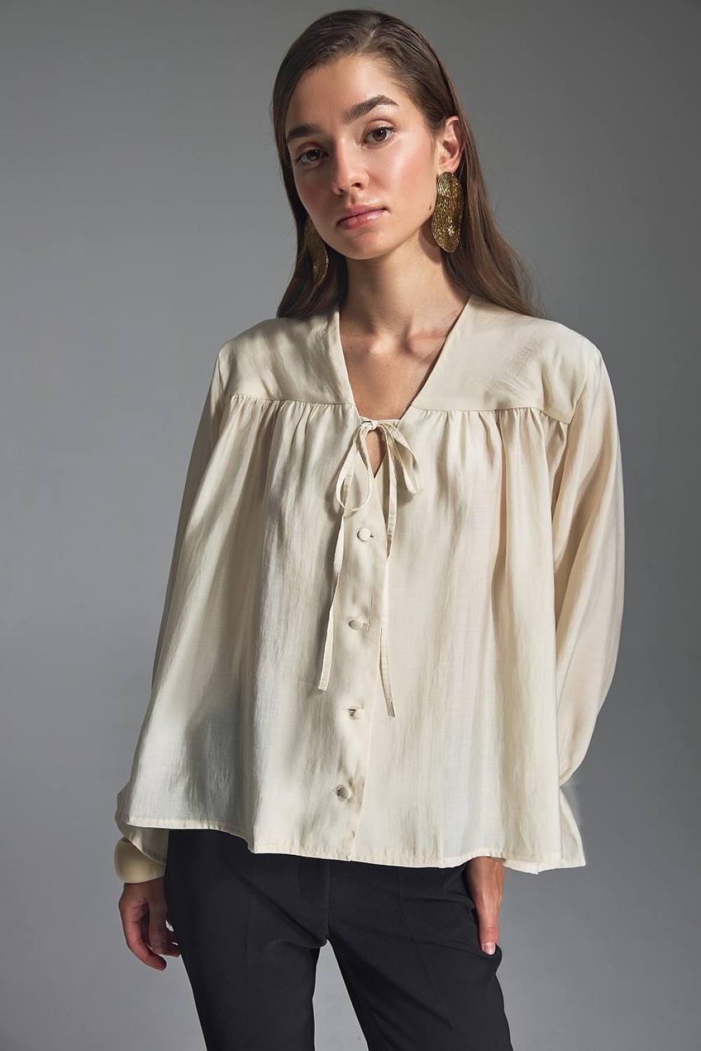 Translucent cream blouse made of Tencel