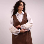 A classic white blouse with embroidered ears of corn