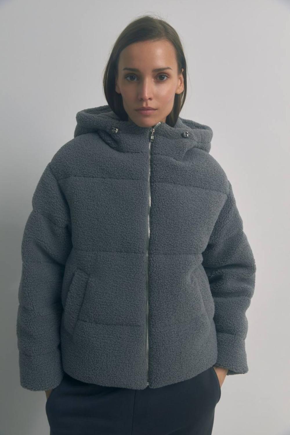 A voluminous jacket with a lining.