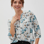 Green blouse in floral print