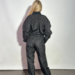 Black suit made of raincoat fabric