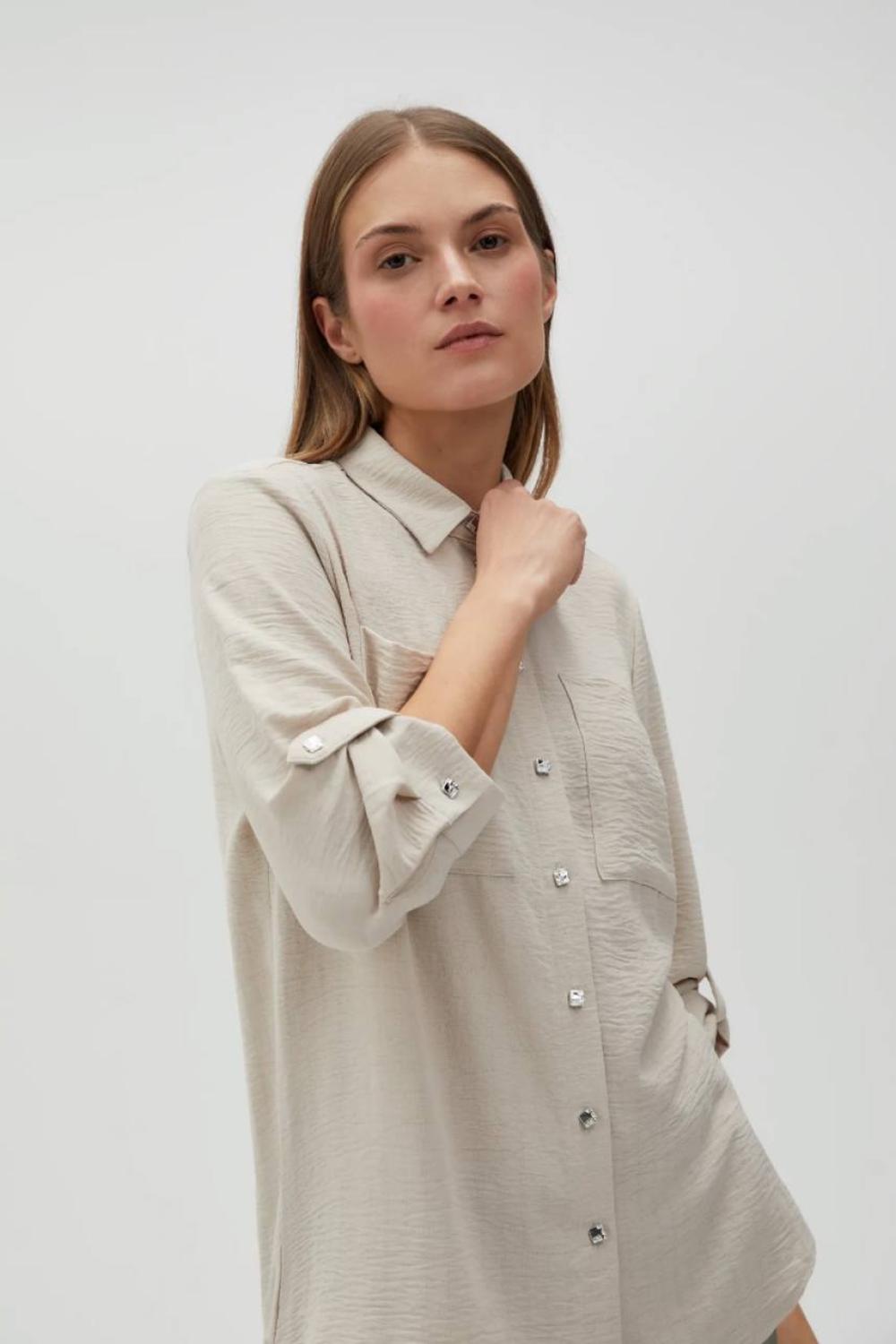 Блуза бежева з жатої тканини