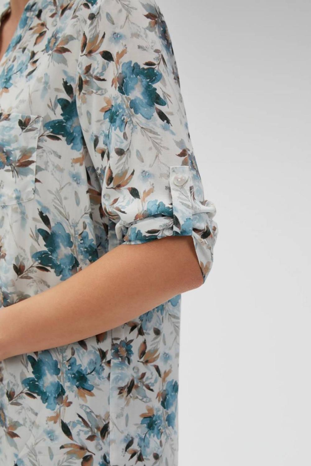 Green blouse in floral print