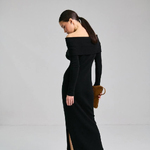 Knitted black dress with open shoulders