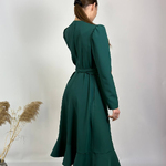 The dress is smelly green with ruffles 907