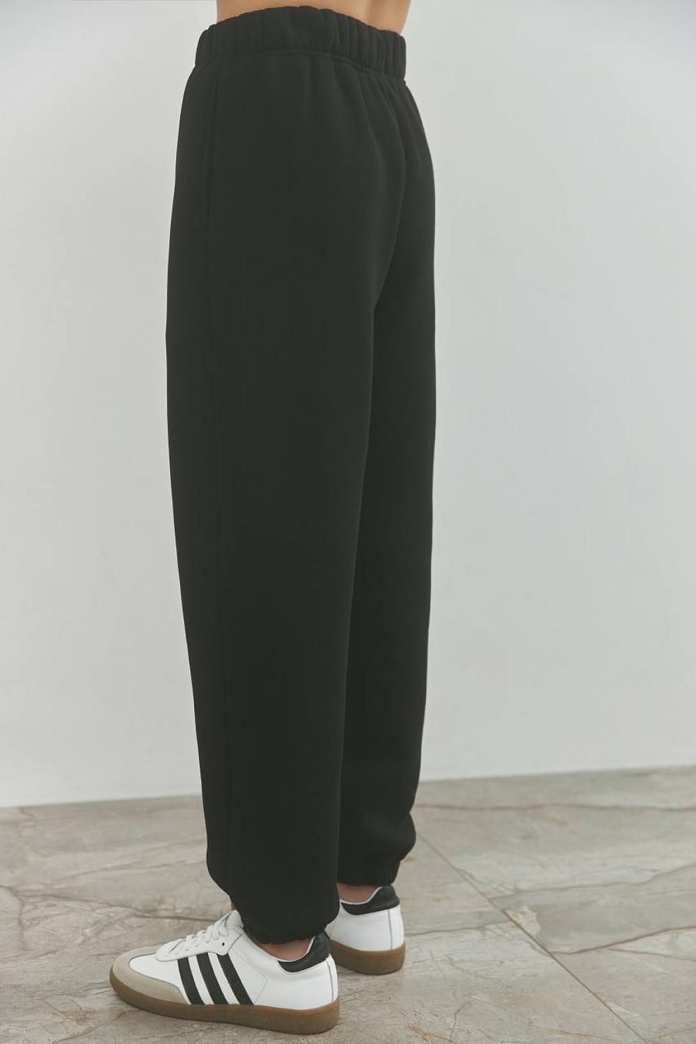Black women's joggers on a bike