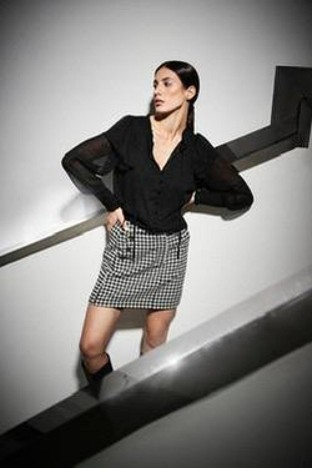 Black translucent blouse with frills
