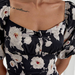 Black silk dress in floral print