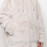 The eco-fur coat is a successful combination of style and comfort