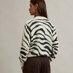 A women's jumper with a geometric pattern