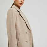 A beige coat