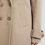 A beige coat