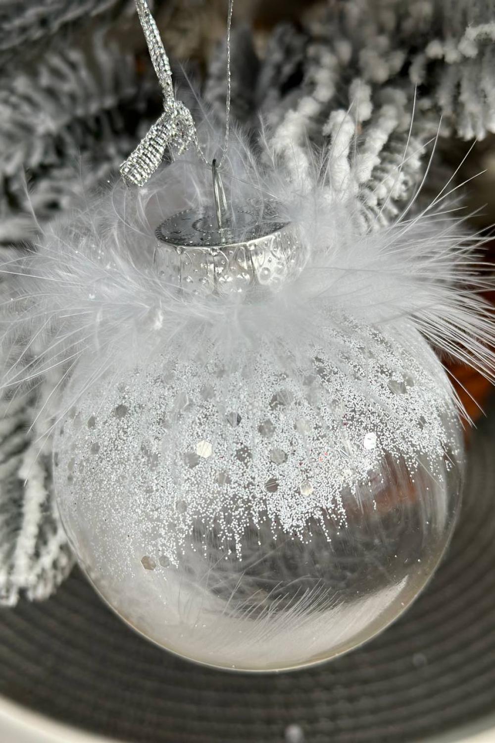 Christmas tree ball with white feathers
