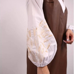 A classic white blouse with embroidered ears of corn