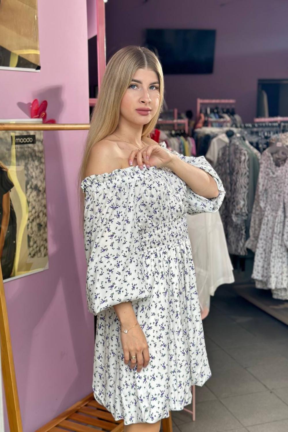 Mini dress with a flower