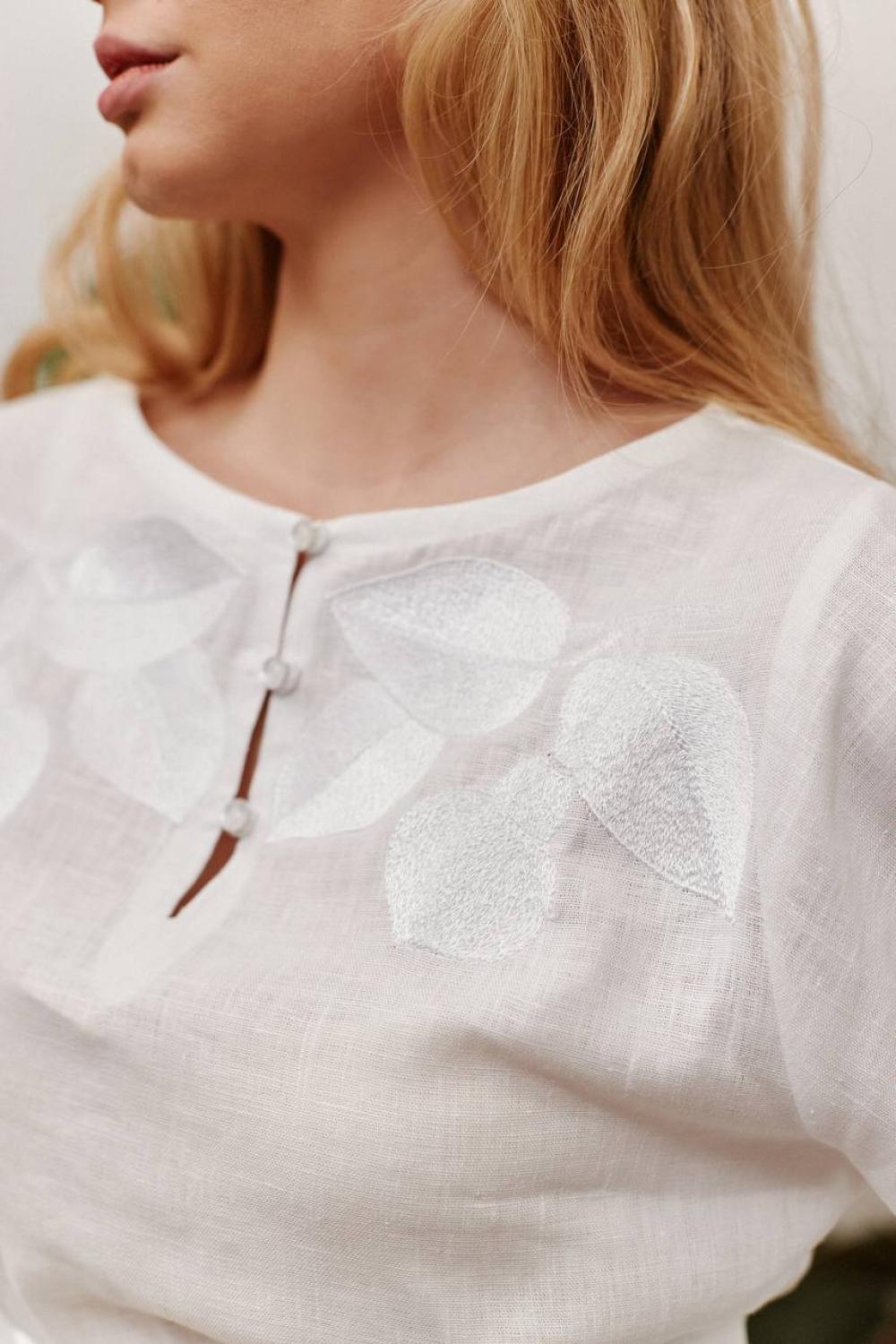 Women's embroidered white on white author's work