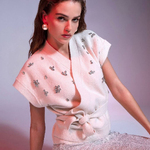 Milk-colored knitted vest nikandra