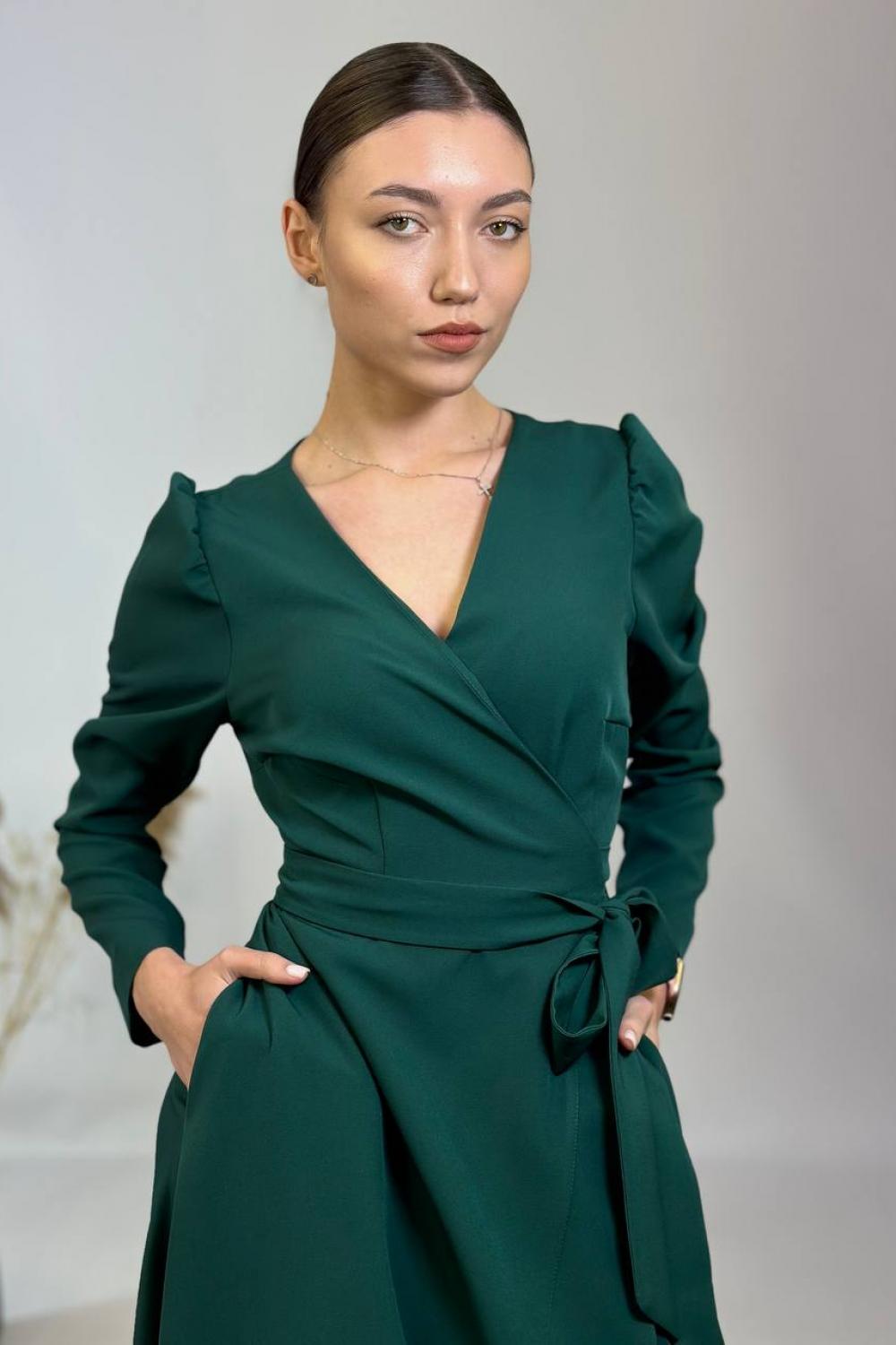 The dress is smelly green with ruffles 907