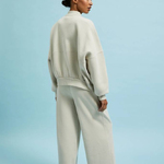 Cream-colored sweater with a zipper