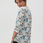 Green blouse in floral print