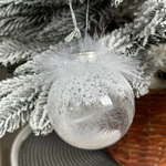 Christmas tree ball with white feathers