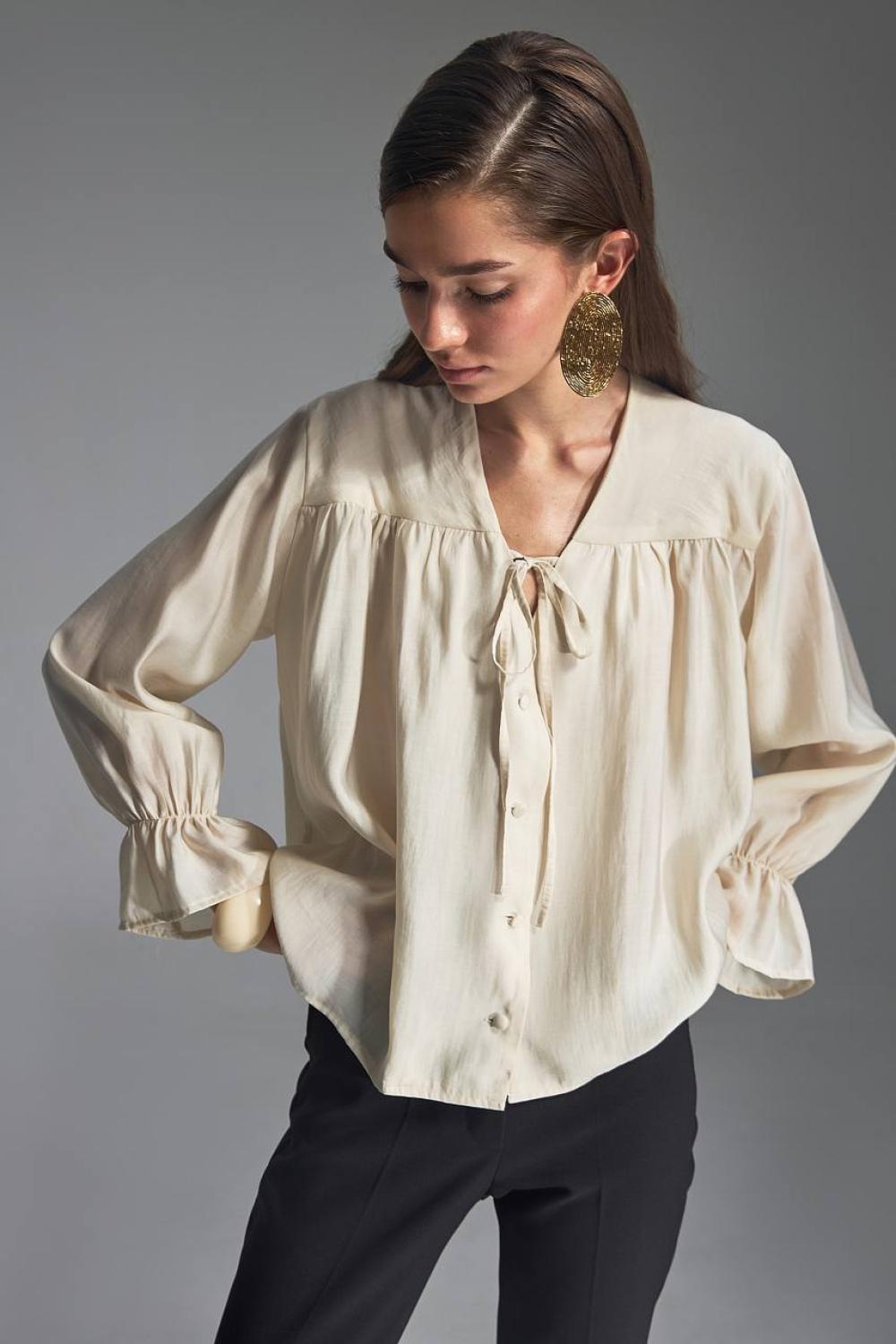 Translucent cream blouse made of Tencel