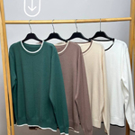 Green knitted sweater with edging