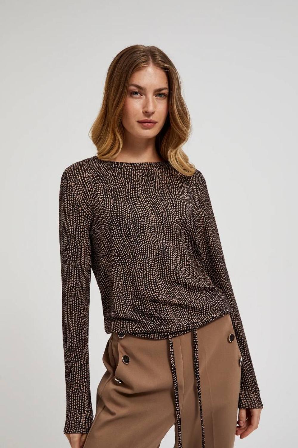 A brown polka dot sweater