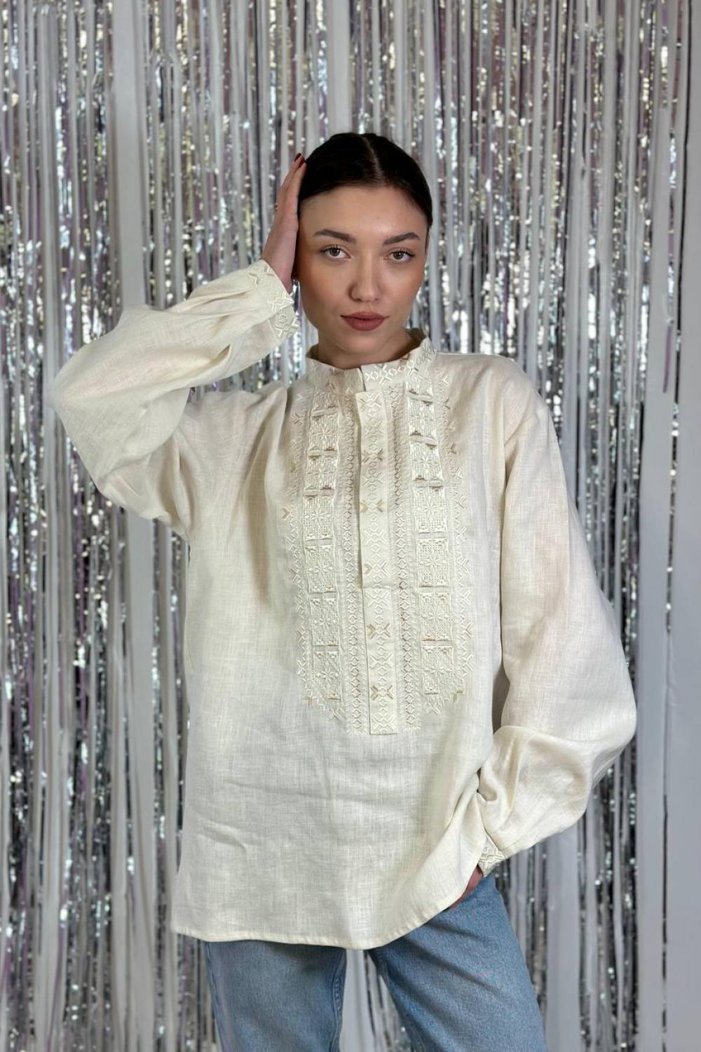 Men's embroidered shirt in a traditional style in a milky ceremonial color