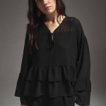 Blouse made of weightless loose fit fabric with ruffles
