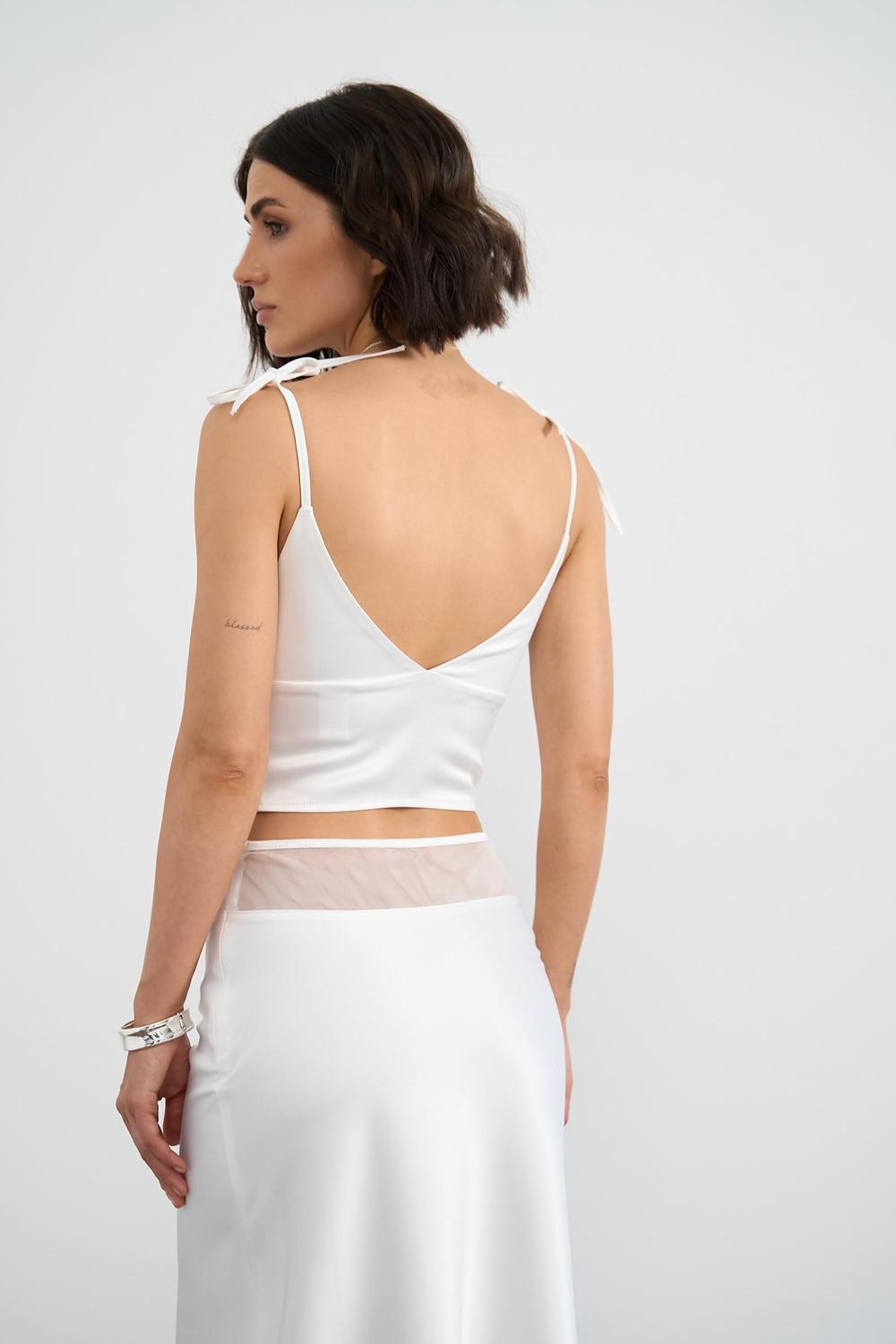 Cream top with silk straps