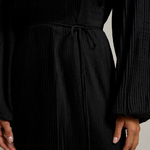 Black dress made of technicolor fabric
