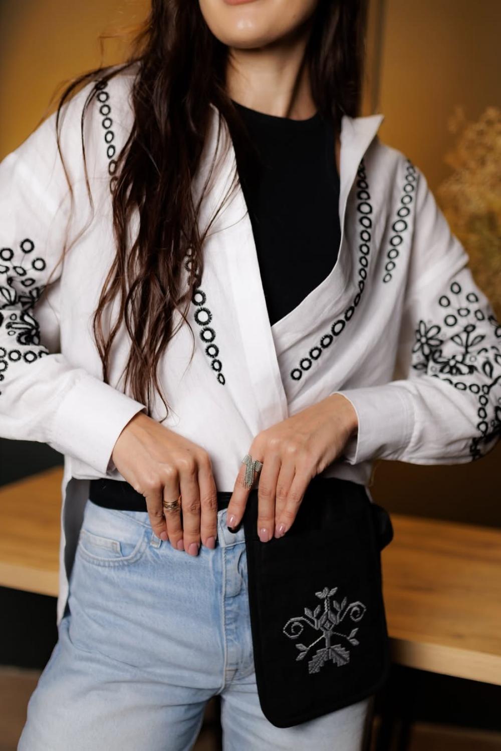An embroidered accessory pocket