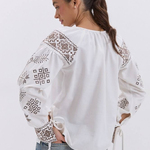 Ecru embroidery
