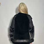 Black and beige eco-fur jacket