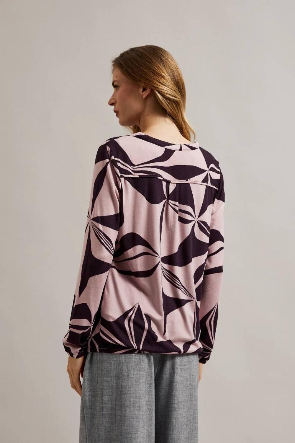 pink printed sweater