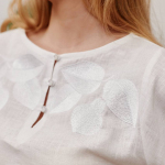 Women's embroidered white on white author's work