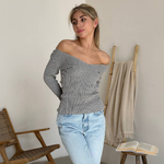 Gray jumper with a figured neckline