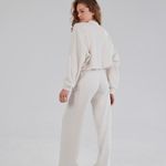 Trouser suit made of high-quality knitwear with an ivory stripe