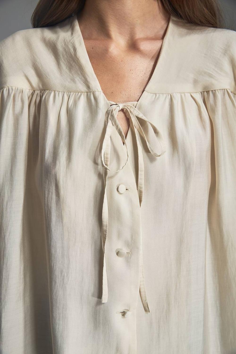 Translucent cream blouse made of Tencel