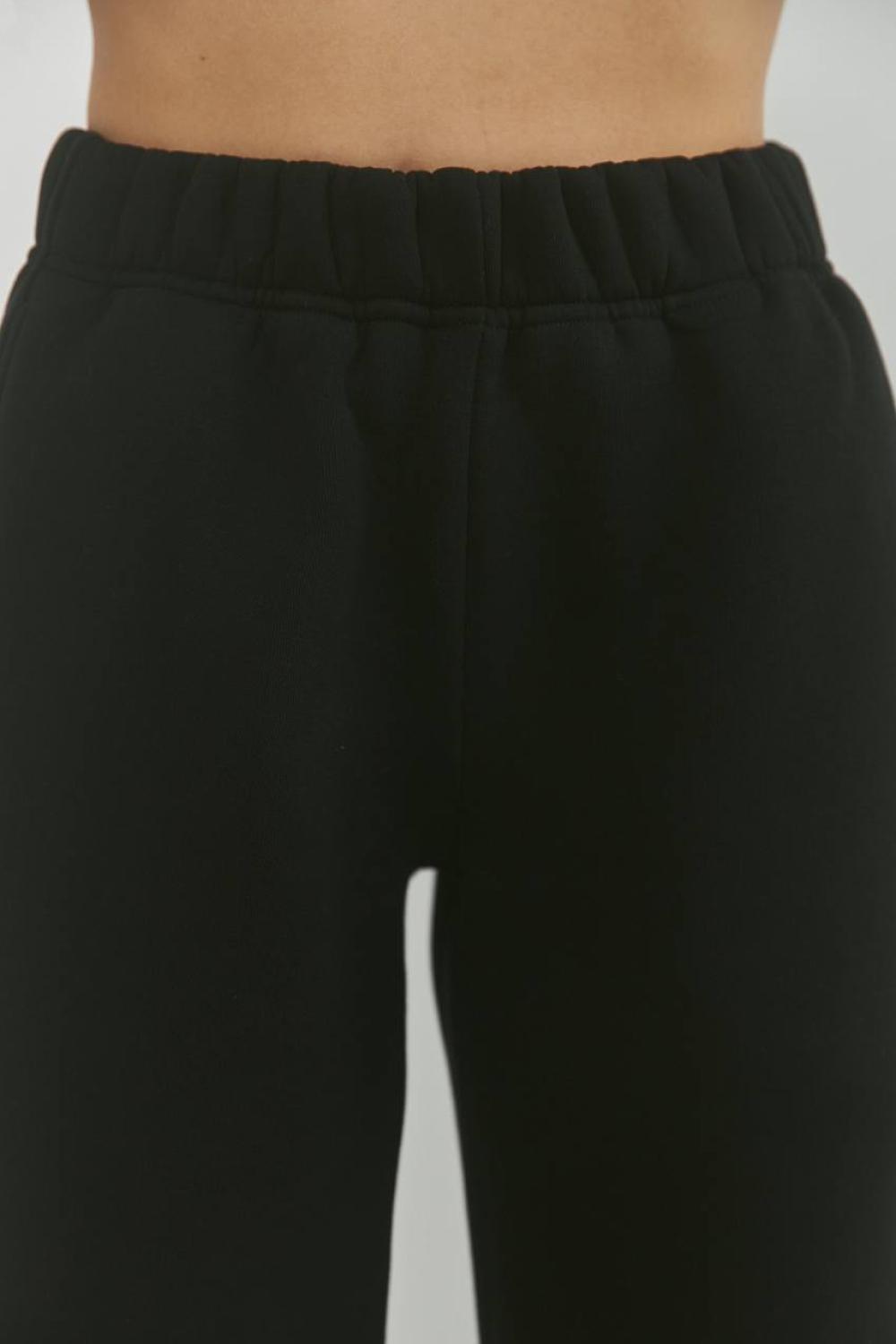 Black women's joggers on a bike