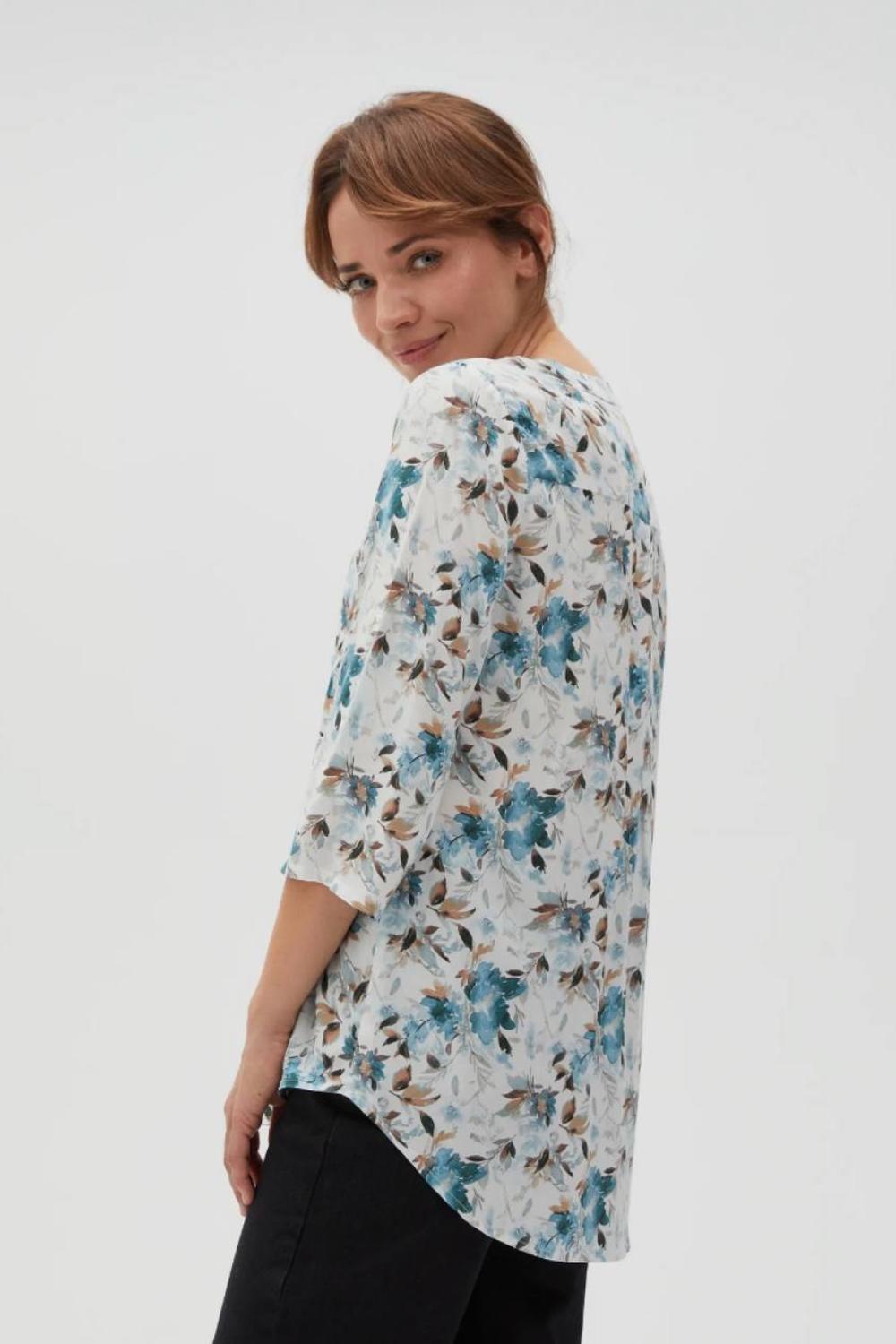 Green blouse in floral print