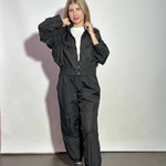 Black suit made of raincoat fabric