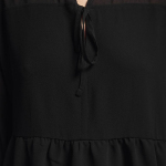 Blouse made of weightless loose fit fabric with ruffles
