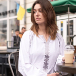 Вишита біла сукня з срібною вишивкою
