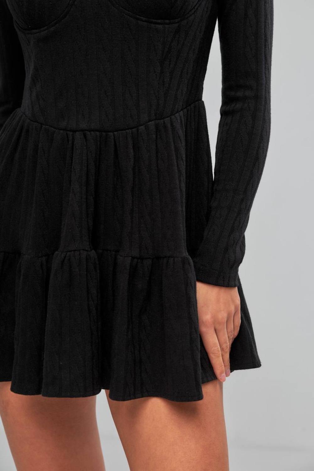 Чорна міні-сукня трикотажна